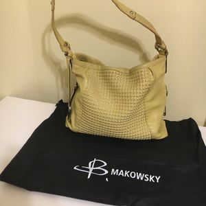 B. Makowsky Bag with Lots of Compartments